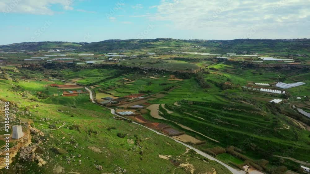 Aerial view of green hills and fields. Winter. Camera move forward. Malta island Aerial view of green hills and fields. Winter. Camera move forward. Malta island