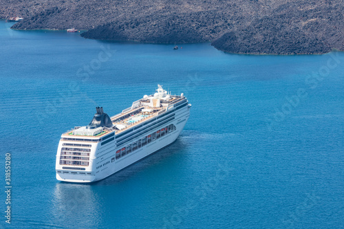 Cruise ship at the sea near the greek islands. Santorini island  Greece.