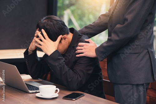 Fotografi the abstract image of the businessman having stress and another person makes it relax