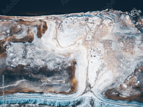 Frozen Nevezis river. Drone aerial view