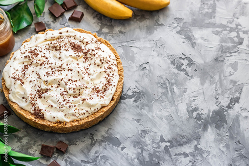 Banoffee pai with pickled pretzels and cream chise. photo