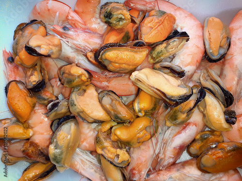 Tray with shrimp and fresh mussels for cooking