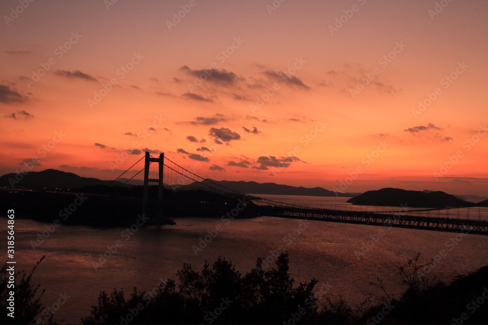 Beautiful sunset with a bridge at Shikoku in Japan 