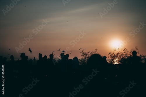 Silhouette of the sea on sunset background of the sky