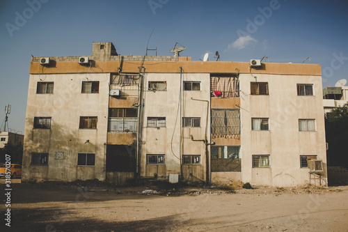 poor dirty building ghetto slum city of Syrian Middle East dangerous war region