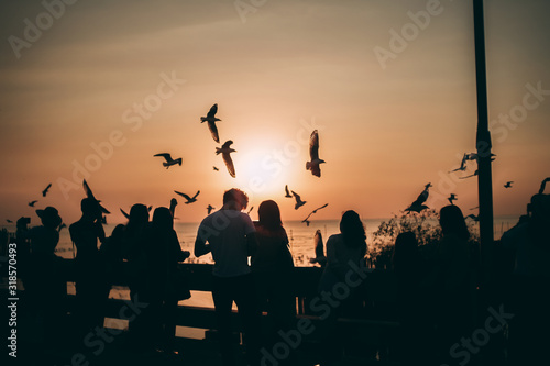 Silhouette of the sea on sunset background of the sky
