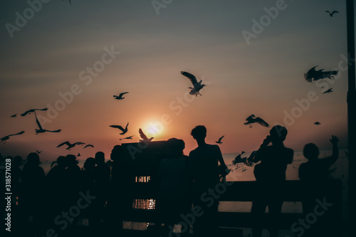 Silhouette of the sea on sunset background of the sky