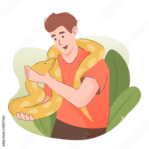 Man holding yellow python snake. People and pet concept