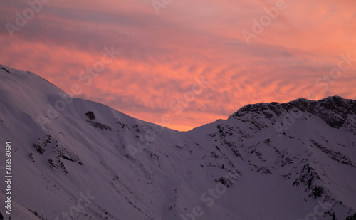 Red sky over the mountains in the Alps © ChrisChips