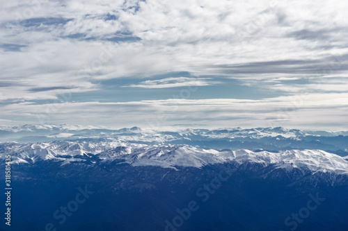 Caucasus mountains. Flight to Kutaisi. Beautiful mountain top view seen from airplane.