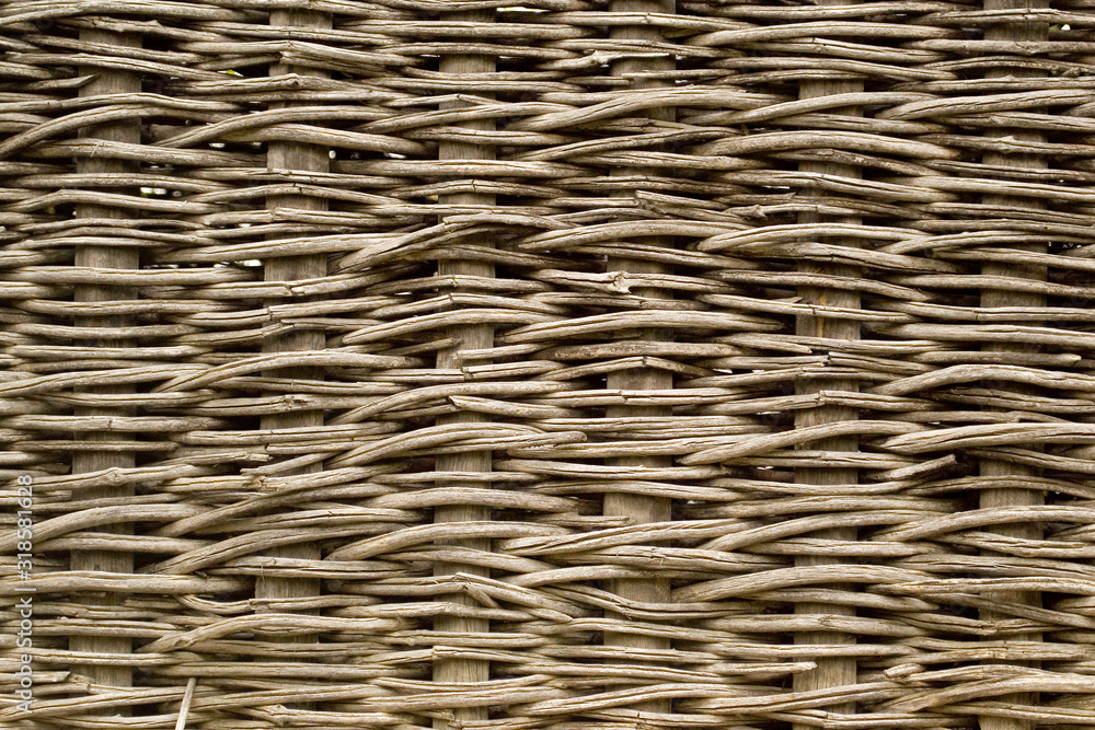Wicker wall of the old summer house. Wicker fence. Tbilisi, Georgia Wicker wall of the old summer house. Wicker fence. Tbilisi, Georgia