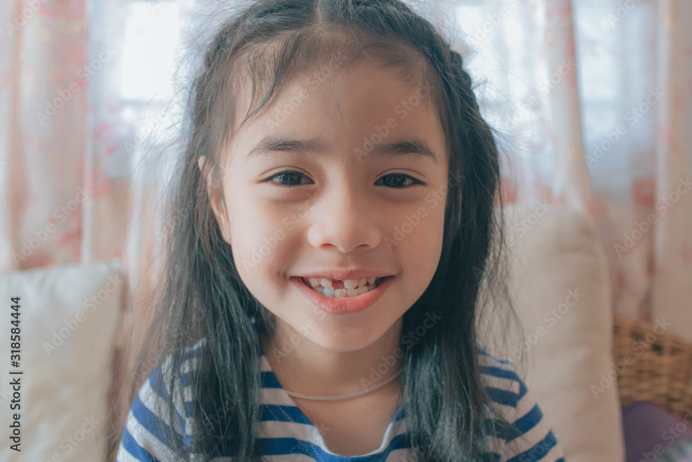 little girl dropped the first milk tooth little girl dropped the first milk tooth