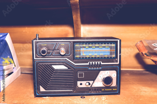 retro radio on wwooden background photo