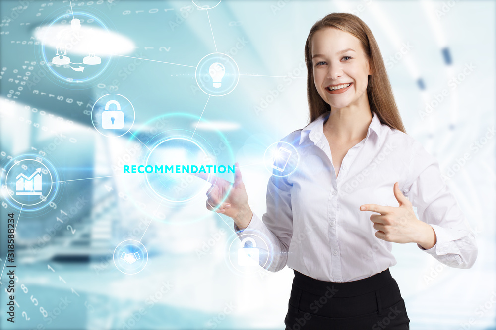 Business, Technology, Internet and network concept. Young businessman working on a virtual screen of the future and sees the inscription: Recommendation Business, Technology, Internet and network concept. Young businessman working on a virtual screen of the future and sees the inscription: Recommendation