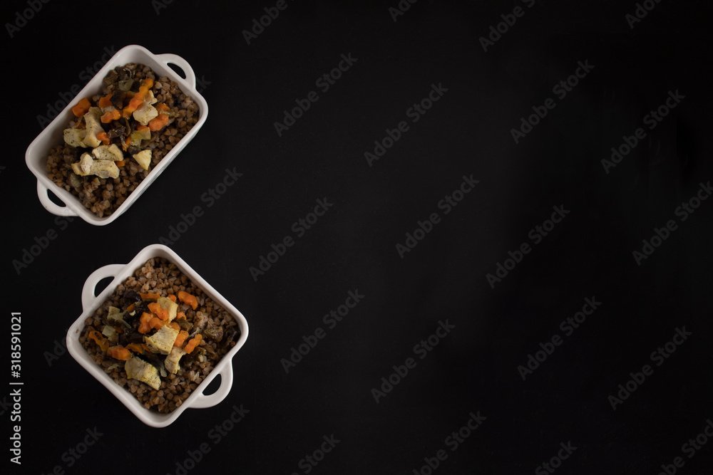 Buckwheat porridge on a dark background, top view. Russian national dish Buckwheat porridge on a dark background, top view. Russian national dish