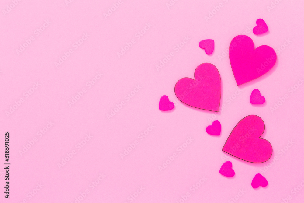 Valentines card with pink hearts on pink background