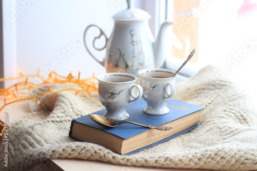 Winter still-life of tea and book