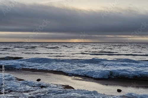 Gulf of Finland in winter at sunset © Denis