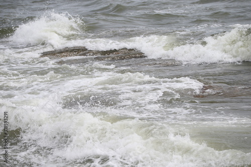 waves crashing on the beach © Champ