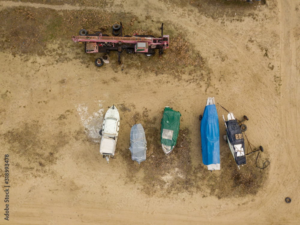Aerial drone view. Winter open-air motor boat parking. Aerial drone view. Winter open-air motor boat parking.