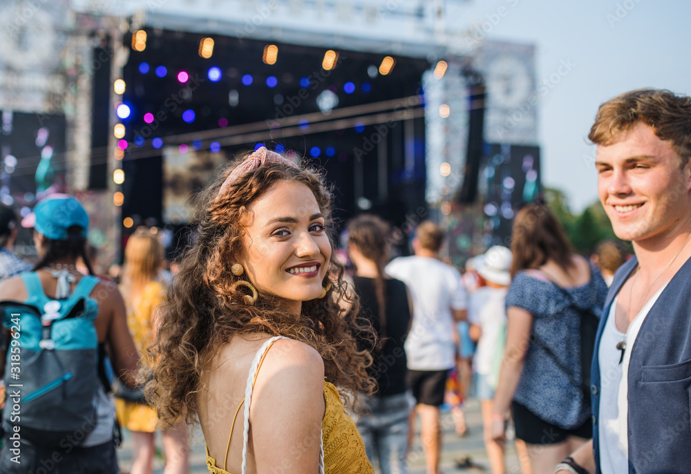 Group of young friends at summer festival.