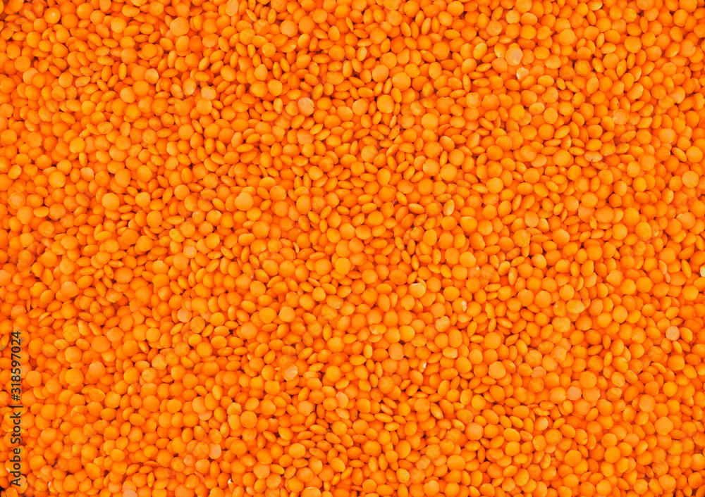Red lentils. Natural background, texture. Natural background, texture. Top view.