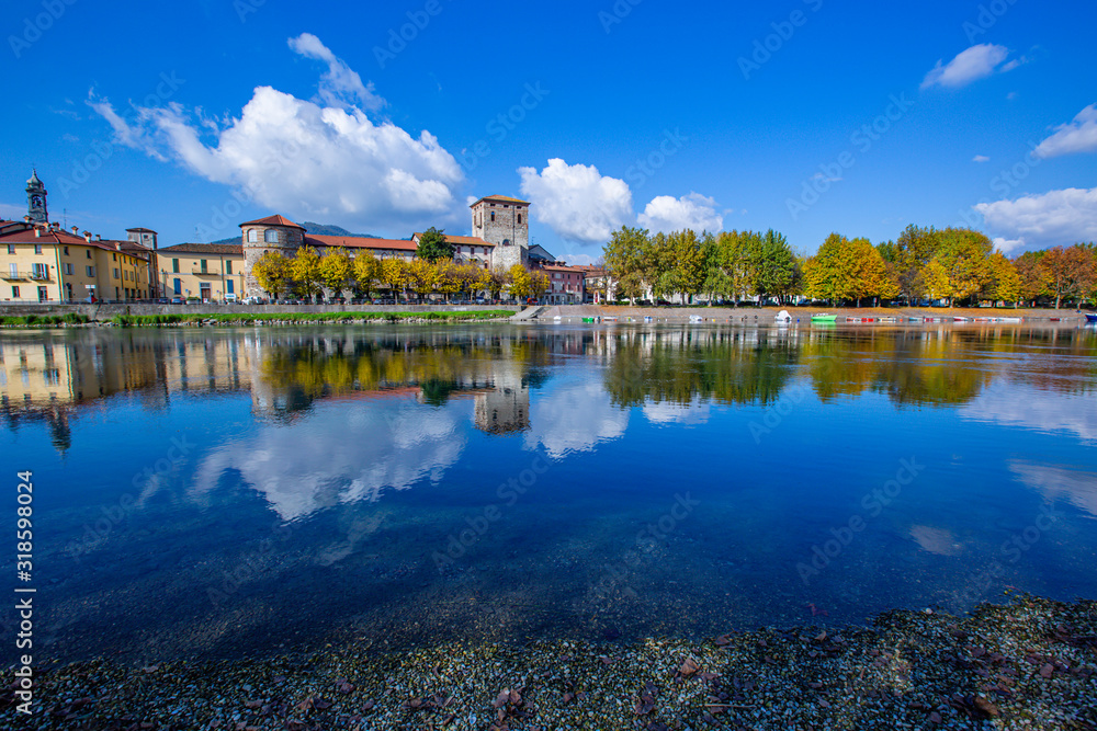 Fototapeta premium Brivio landscape reflected on the Adda river with the bridge