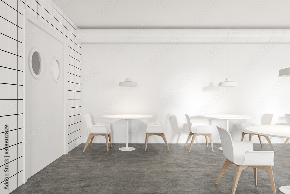 Fototapeta premium Comfortable restaurant interior with round tables