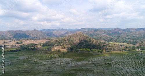 View of rice terraces and hills in nanggulan photo