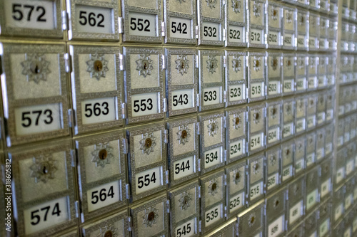 Numbered vintage mail boxes in a Post Office