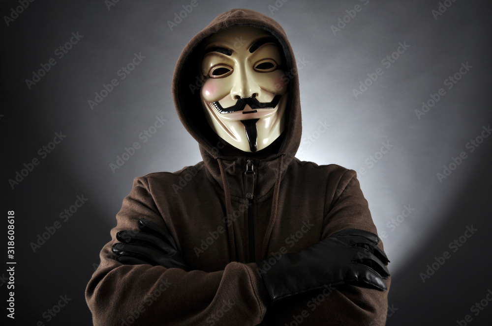 Anonymous with Guy Fawkes Mask in Studio Stock Photo | Adobe Stock