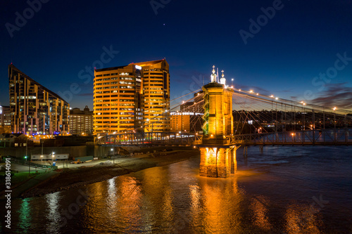 Aerial night photo bridge lit with starry sky John Roebling photo