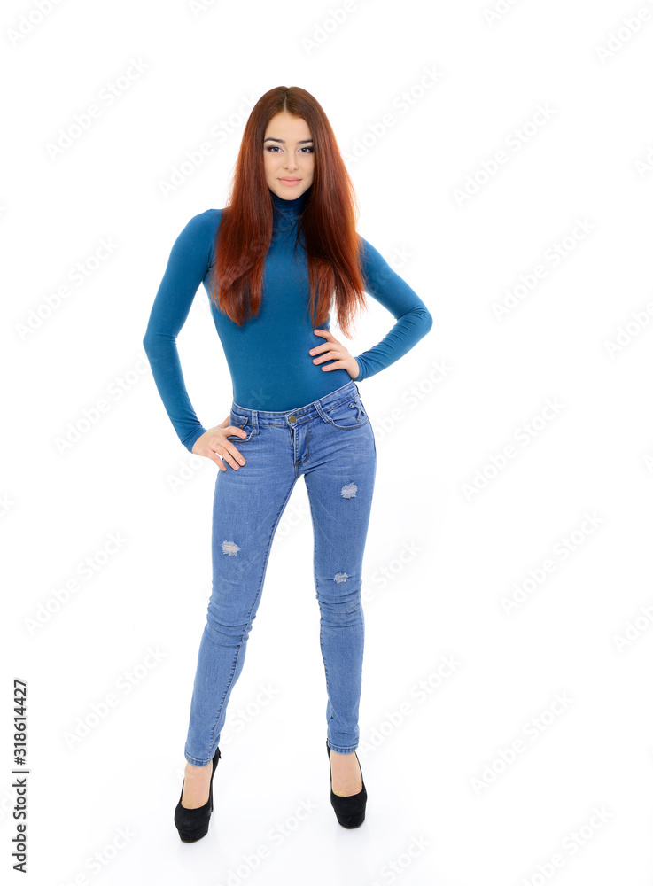 beautiful girl portrait with long red hair in blue sweater over white studio shot beautiful girl portrait with long red hair in blue sweater over white studio shot