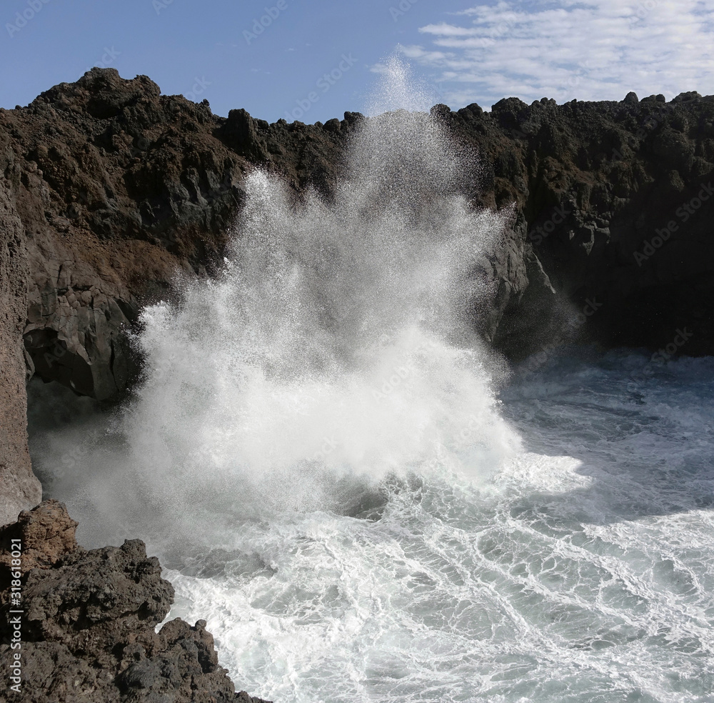 Fototapeta premium Lanzarote. High waves splashing the coast.