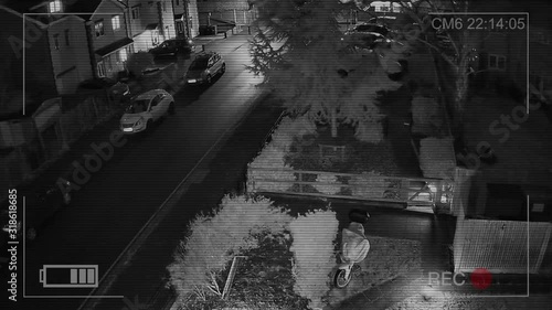 CCTV camera or surveillance system is in operation on garden, car park at night