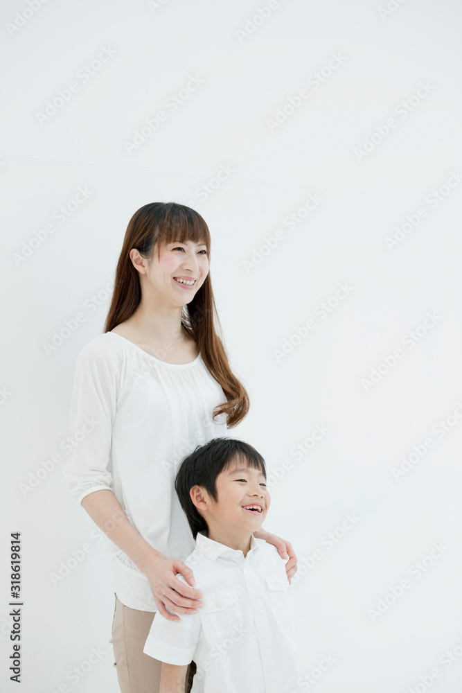 Studio shot of smiling mother and son Studio shot of smiling mother and son