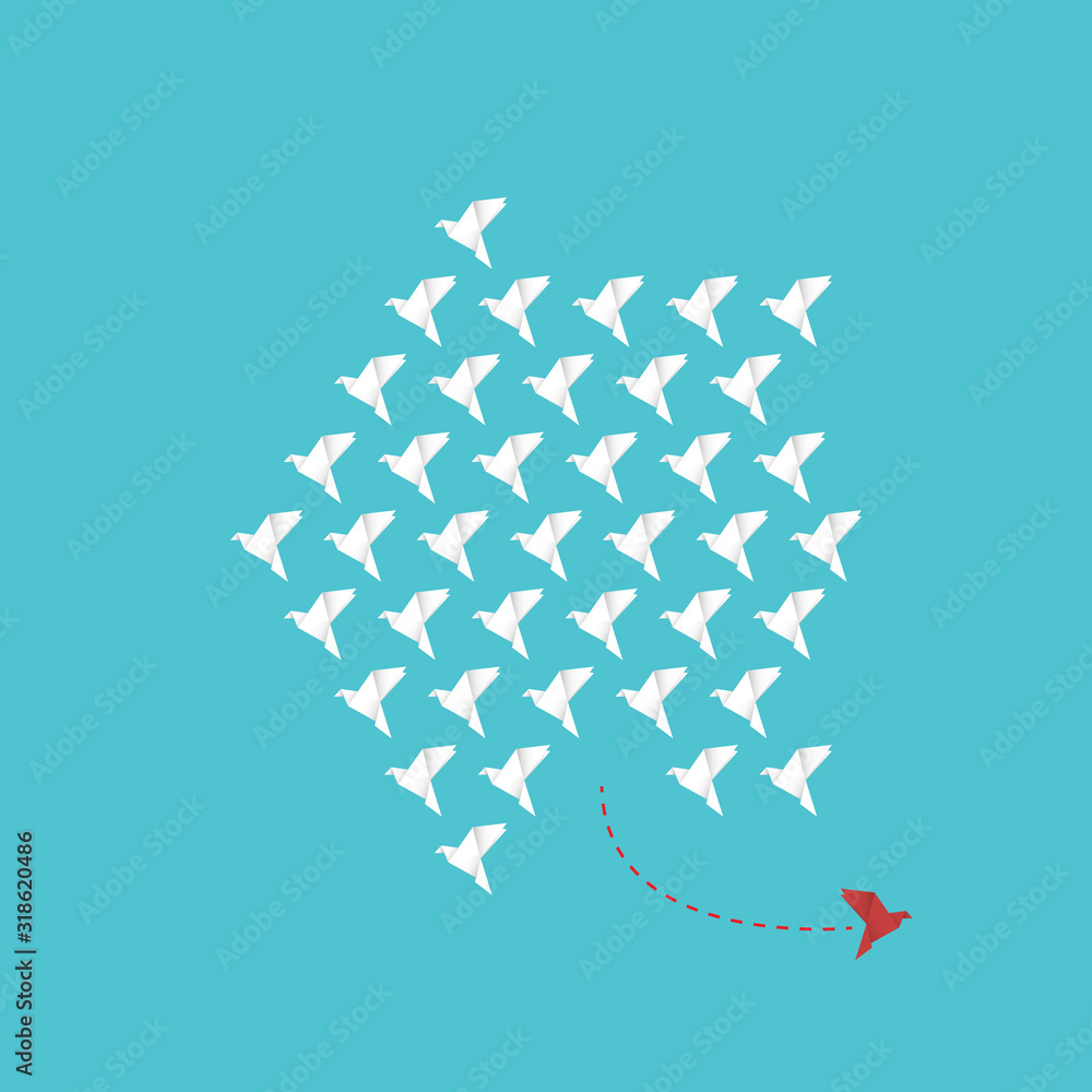 Obraz premium Think differently - One red unique different paper bird flying opposite way of identical white ones.&nbsp;