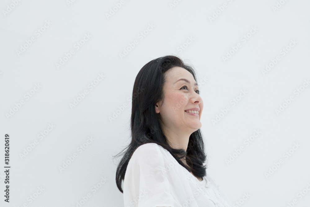 Studio shot of smiling mature woman Studio shot of smiling mature woman
