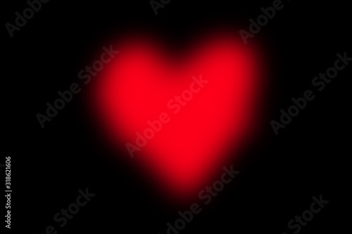 Abstract blured red heart isolated on black background  meaning love and valentine concept.