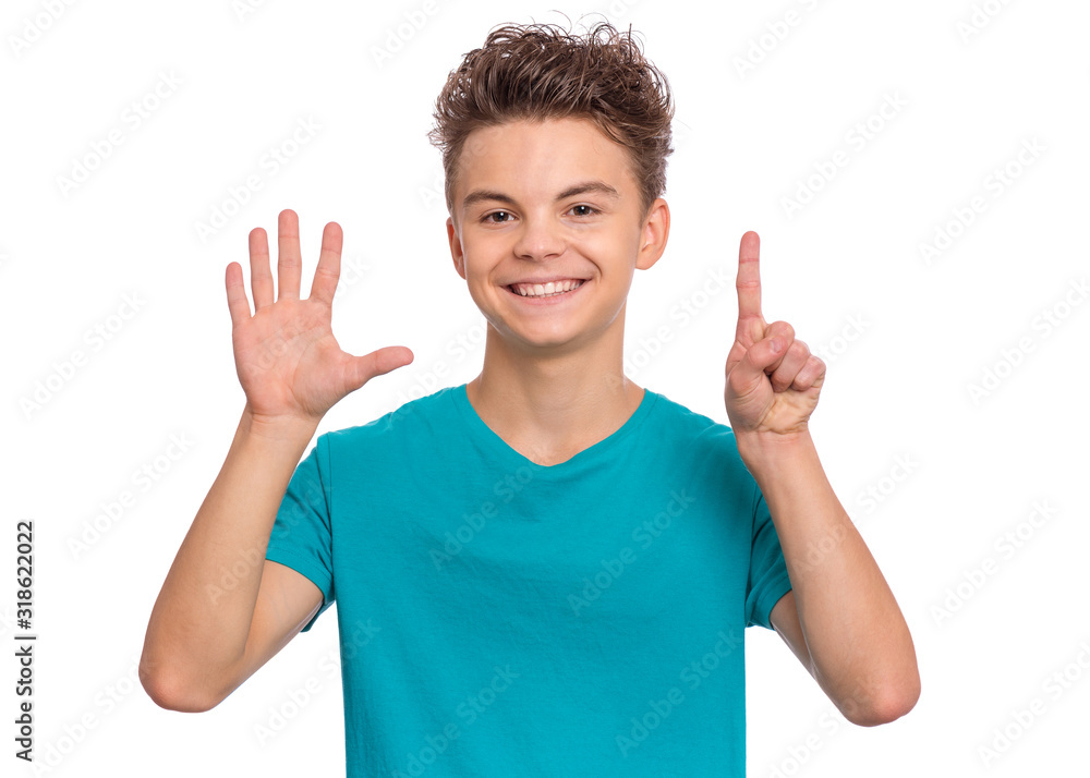 Portrait of happy teen boy showing two palms - 6 fingers, isolated on white background. Happy smiling child doing gesture of number Six. Series of photos count from 1 to 10. Portrait of happy teen boy showing two palms - 6 fingers, isolated on white background. Happy smiling child doing gesture of number Six. Series of photos count from 1 to 10.