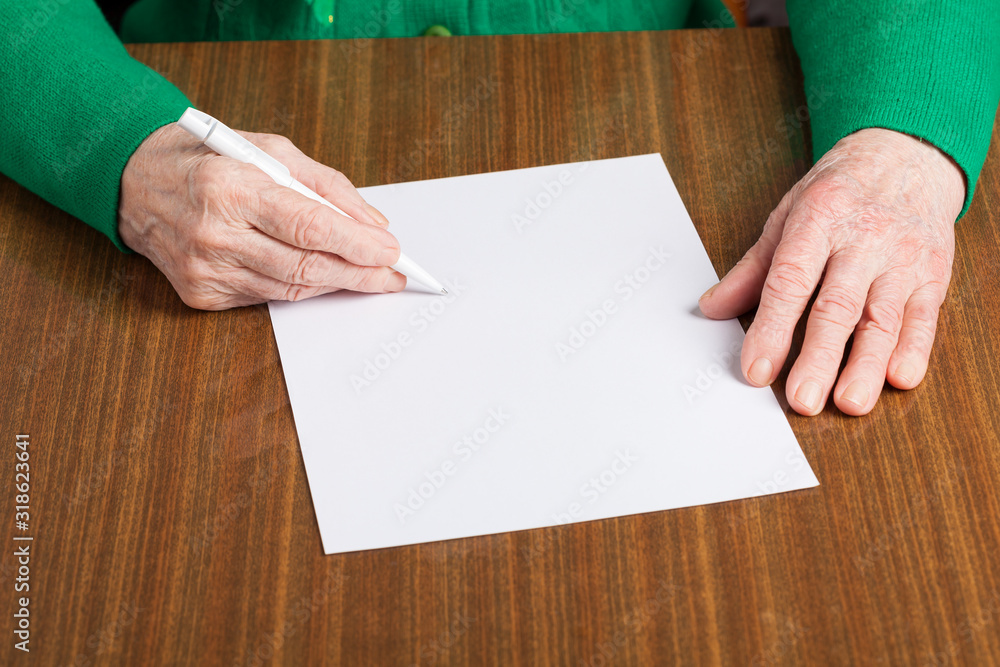 Old hands with blank paper Old hands with blank paper