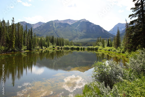 Fototapeta Naklejka Na Ścianę i Meble -  Lake, Mountain lake, alpine meadows and rocky summits in the Rocky Mountains in Canada, British Columbia, West coast