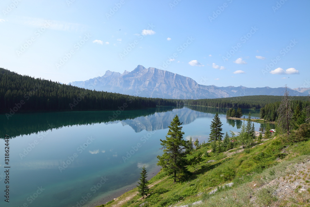 Lake, Mountain lake, alpine meadows and rocky summits in the Rocky Mountains in Canada, British Columbia, West coast