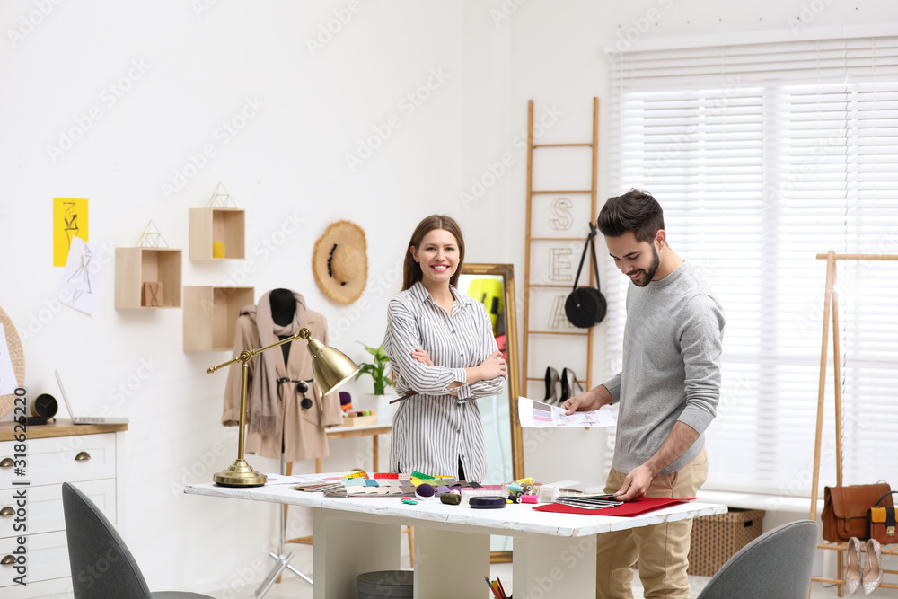 Fototapeta premium Fashion designers creating new clothes in studio