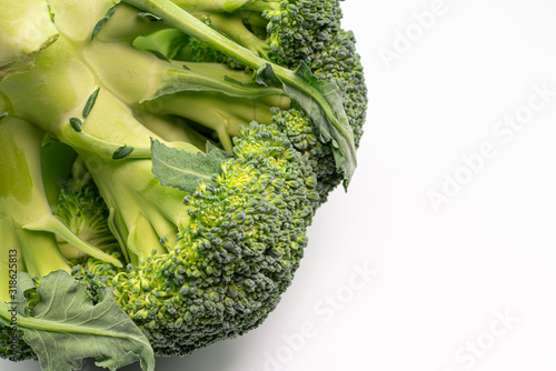 Fresh broccoli in closeup isolated on white background.Healthy f photo