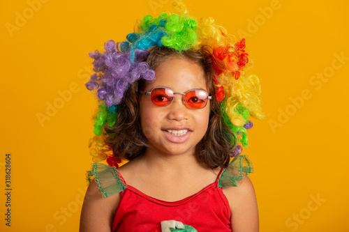 beautiful happy child dressed for carnival party