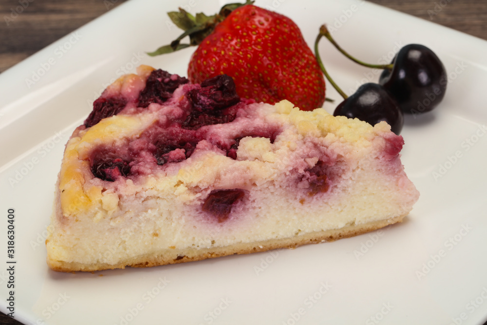 Cheesecake with cherry served strawberry Cheesecake with cherry served strawberry
