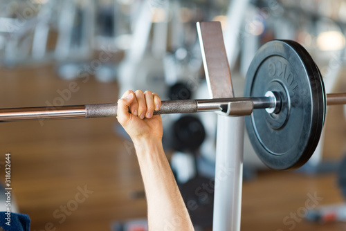 Man training gym fitness bodybuilding