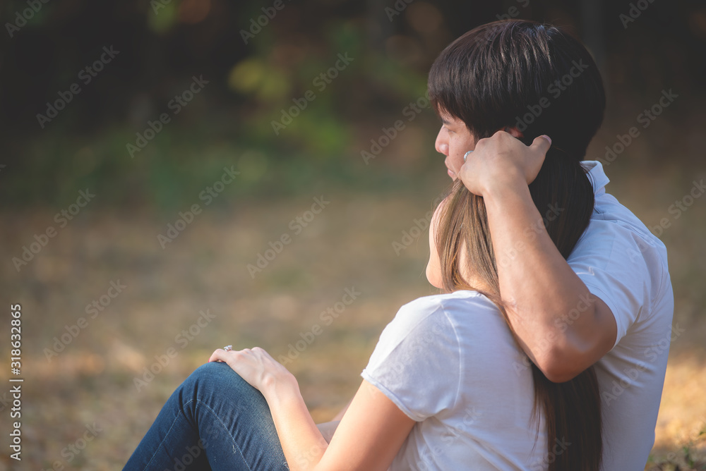 Portrait of young asian couple in love in the forest,Thailand people happy to be together,Valentine day concept Portrait of young asian couple in love in the forest,Thailand people happy to be together,Valentine day concept