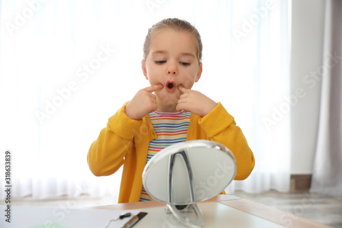 Bild auf Leinwand Cute little girl at speech therapist office